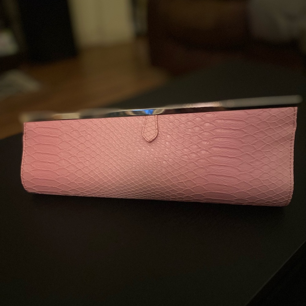 Pink faux python clutch purse